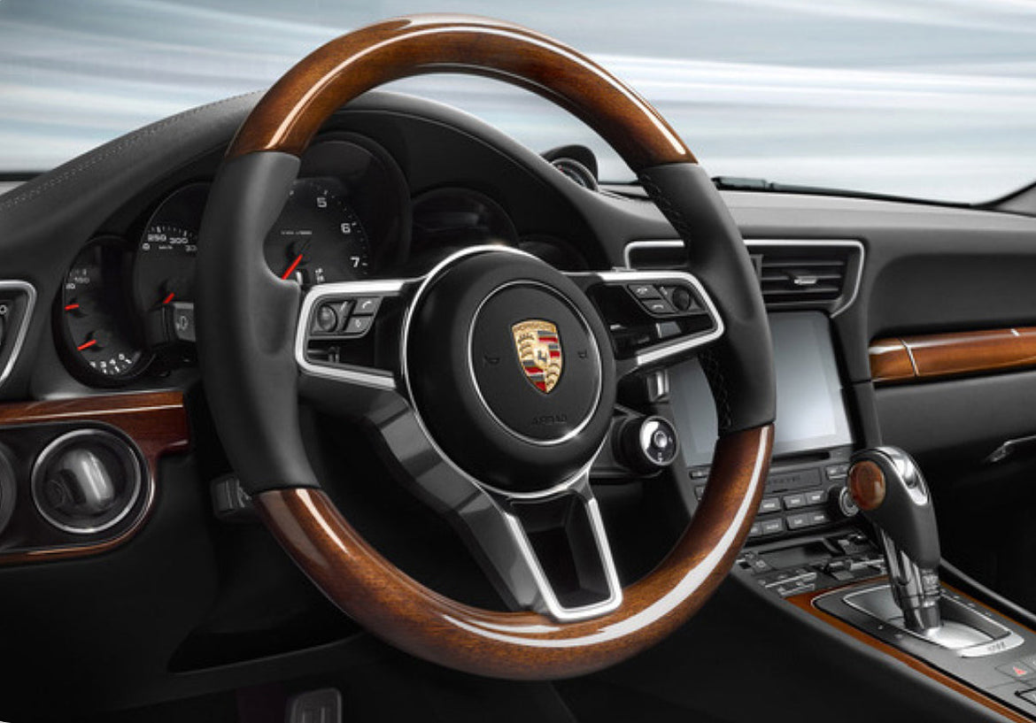 Why It's Worth Replacing Your Porsche Steering Wheel: Upgrade to Wood & Leather for a Perfect Interior Match