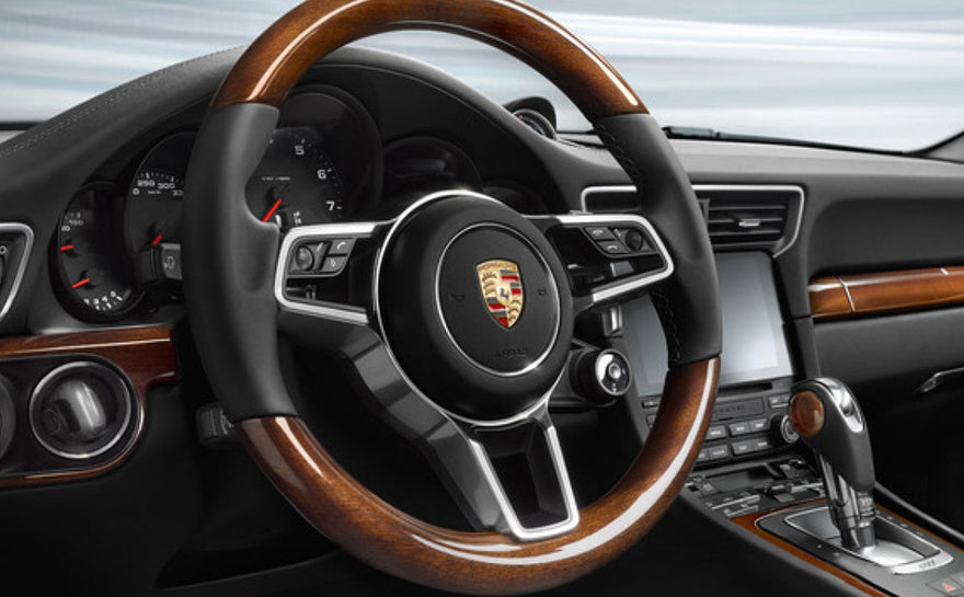 Why It's Worth Replacing Your Porsche Steering Wheel: Upgrade to Wood & Leather for a Perfect Interior Match
